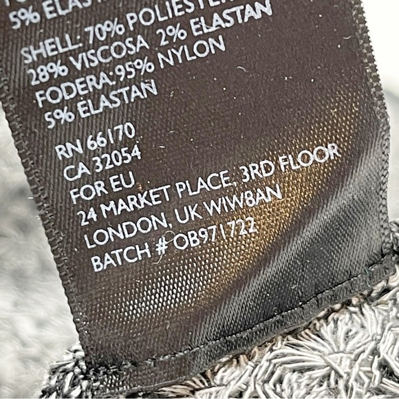 URBAN OUTFITTERS Women’s Black Marled Waffle Knit Double-V Peplum Top Size L - Picture 7 of 7